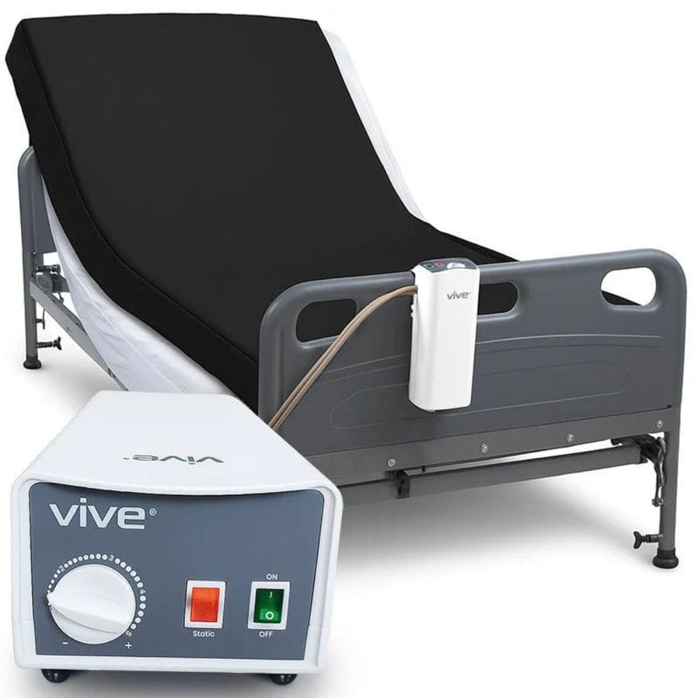 Vive electric hospital bed with control panel on a white background