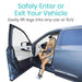 Woman using a car entry and exit aid to safely enter or exit a vehicle.