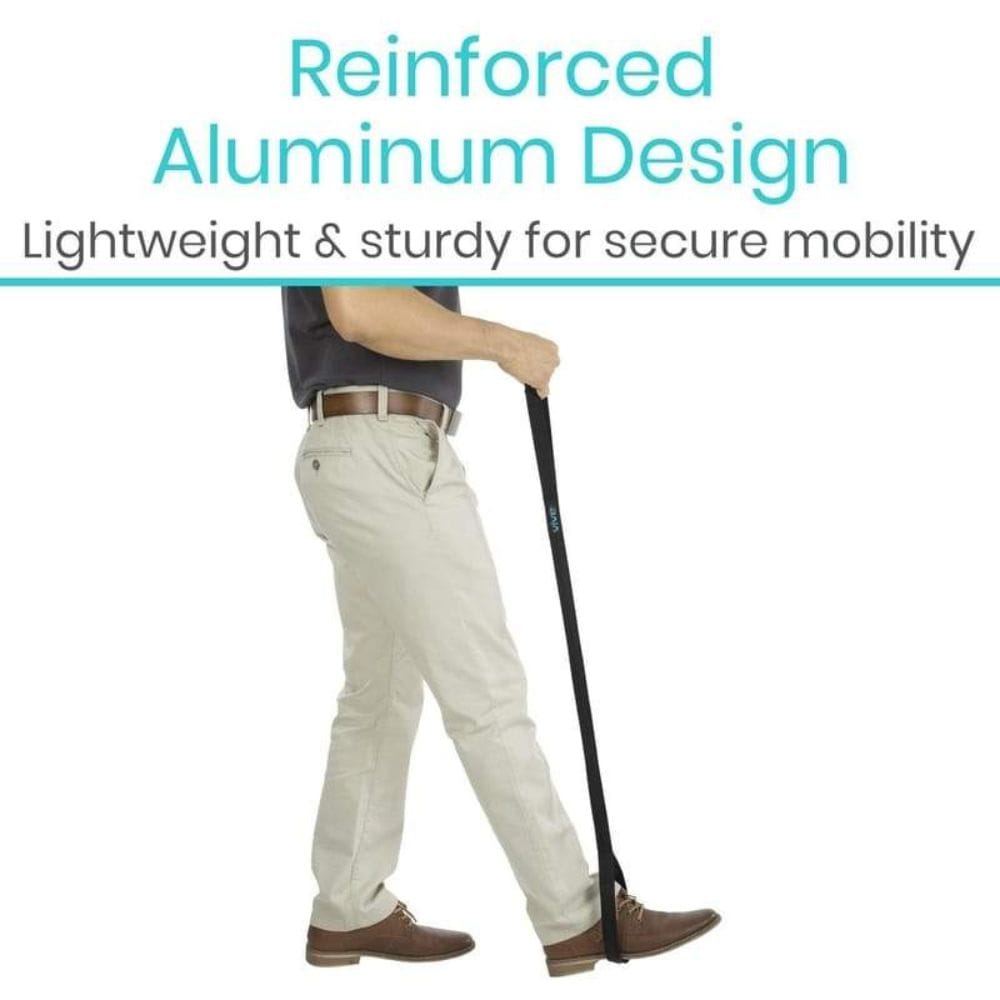 Person holding a black cane with text about reinforced aluminum design on a white background