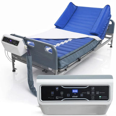 Electric hospital bed with blue mattress and control panel on a white background