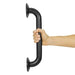 Black grab bar with a hand holding it on a white background