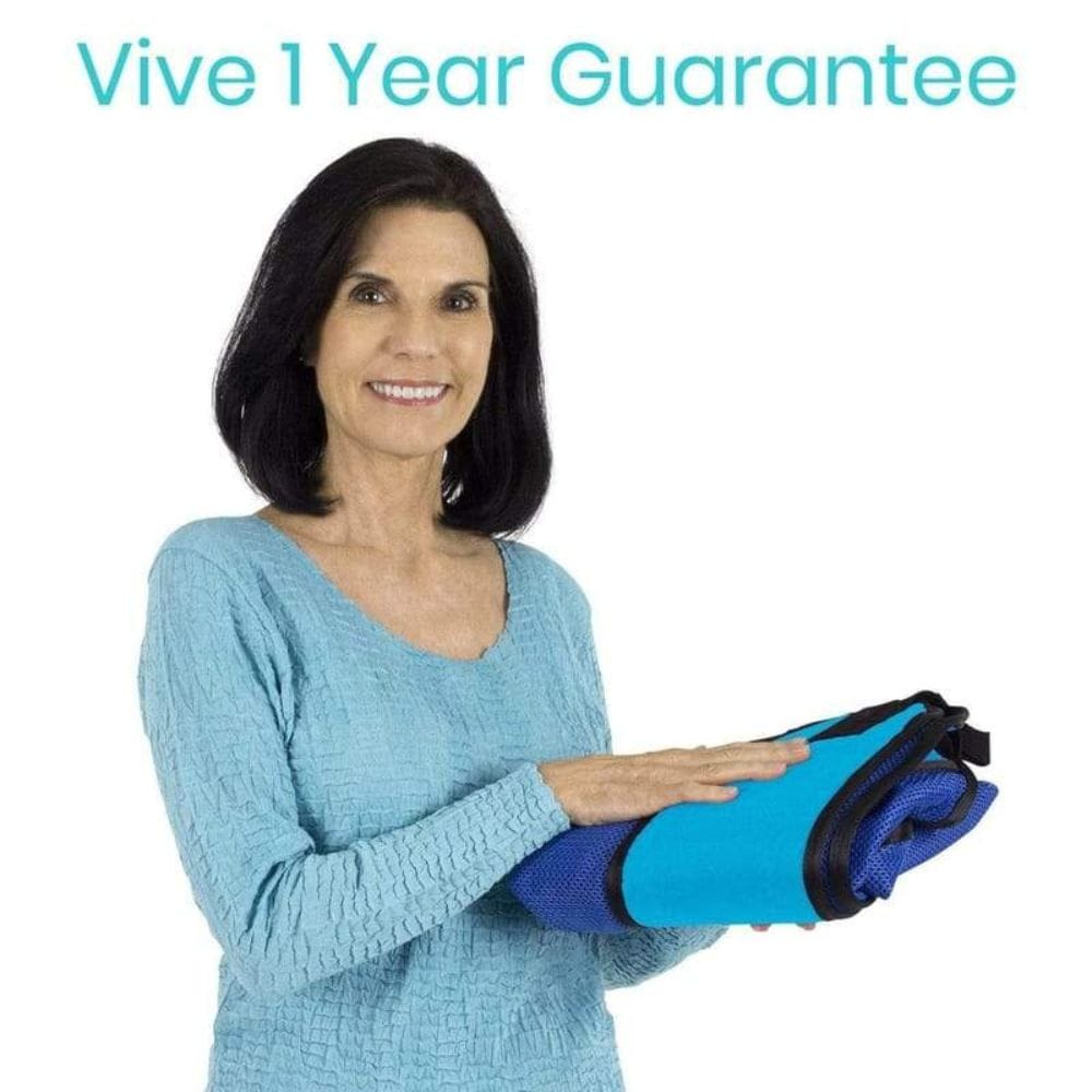 Woman holding a blue and black product with 'Vive 1 Year Guarantee' text above.