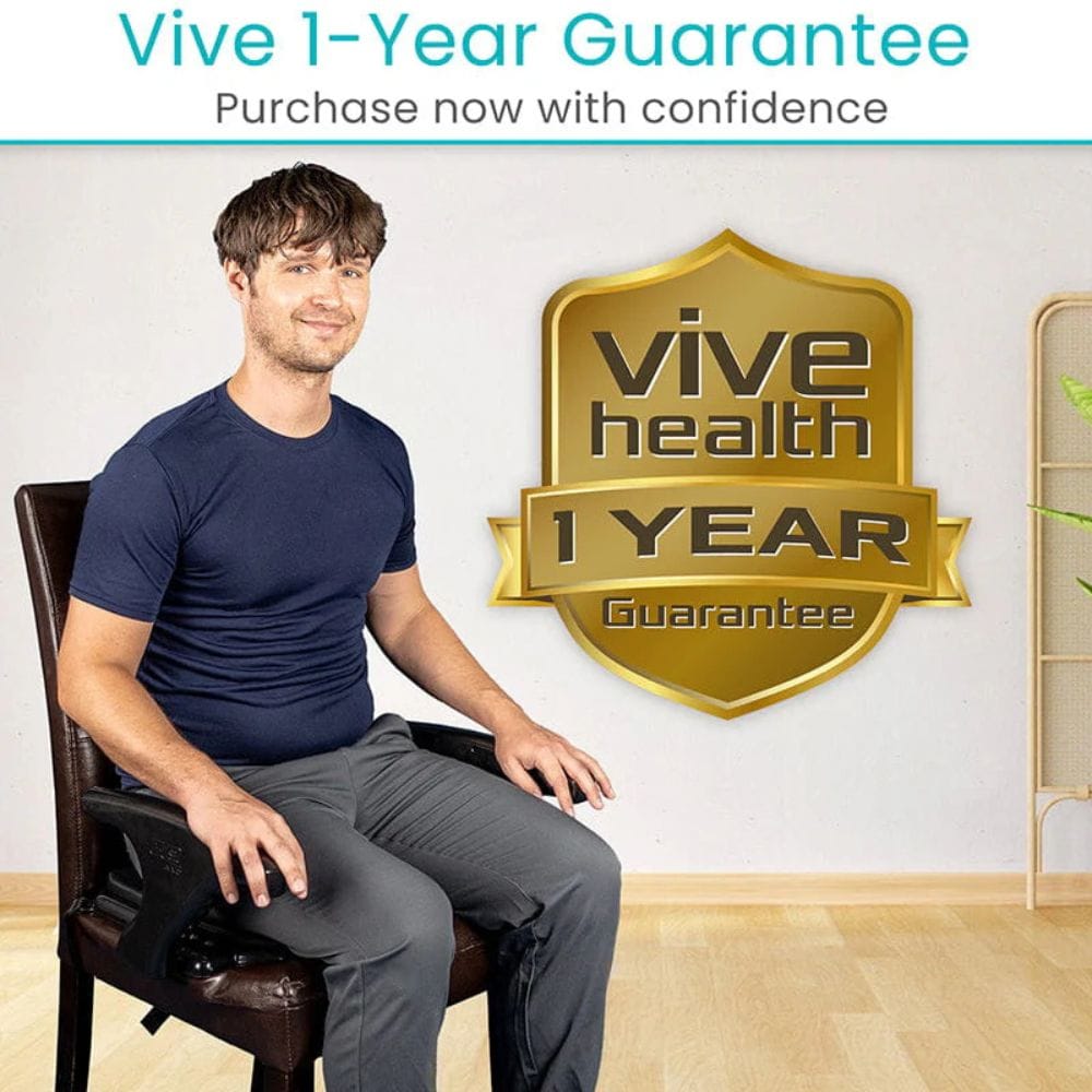 Man sitting on a chair with 'Vive Health' 1-year guarantee badge displayed.
