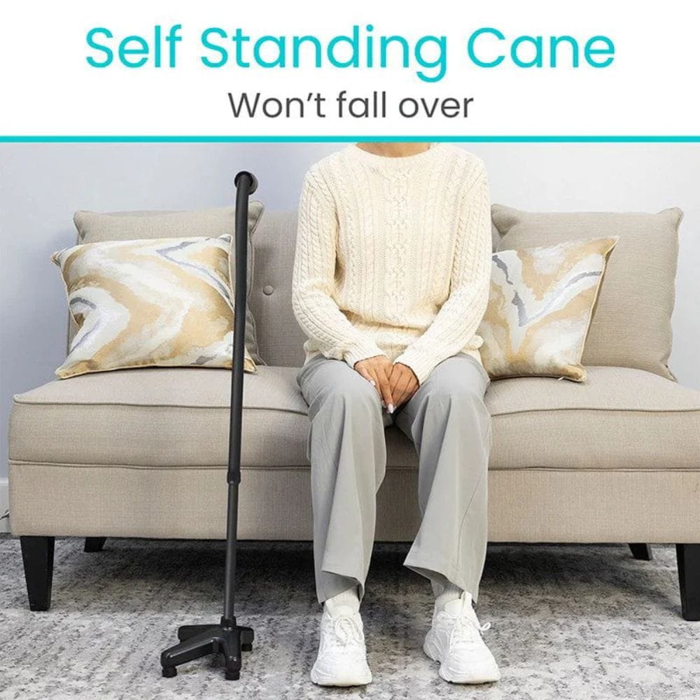 Person sitting on a couch with a self-standing cane in front of them, text 'Self Standing Cane Won't fall over' above.