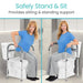 Woman using a toilet safety seat with support bars in a bathroom setting.