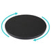 Black round mat with blue arrows indicating rotation on a white background