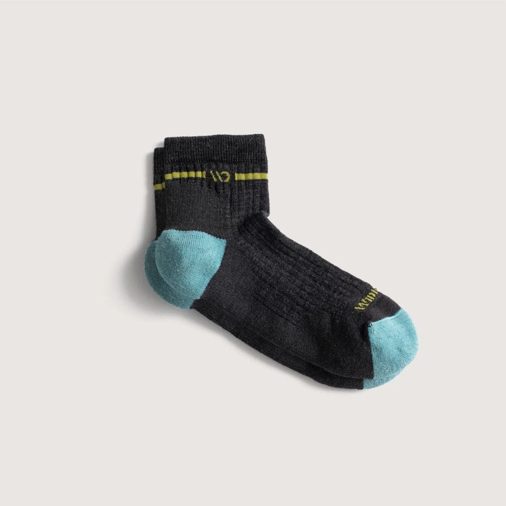 Black sock with blue toes and yellow accents on a light gray background