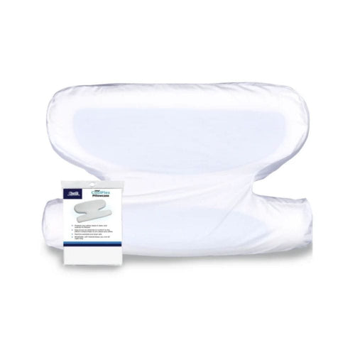 A white contoured pillow with a matching fitted sheet and a small product tag, photographed on a plain white background.